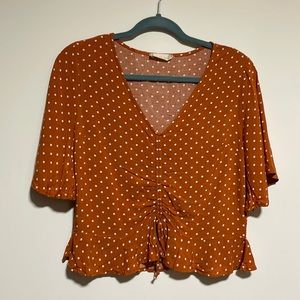 Altar’d State polka dot orange top in size Small